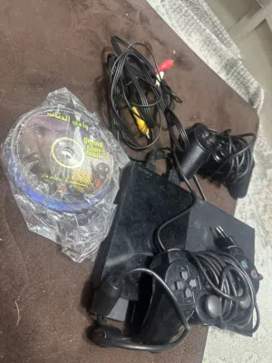 بلاي ستيشن 2 (PS2 (sonyمستعمل مع ايدتين وسيديات