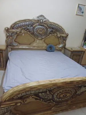 king size bed and dressing table with mattress and side tables