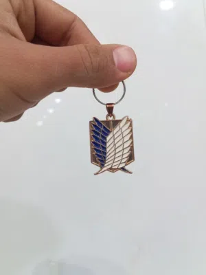 ميداليه مفاتيح شعار اتاك اون تايتن ذهبي