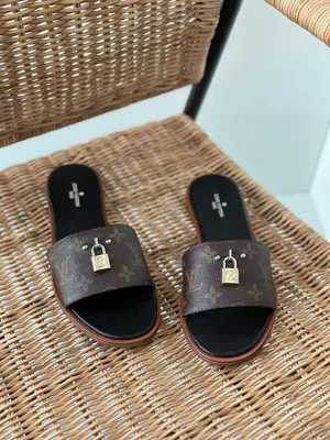 Slippers & Flip Flops . Louis Vuitton . 363
