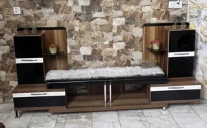 ميز تلفزيون" أو "وحدة تلفزيون" (TV Unit).
