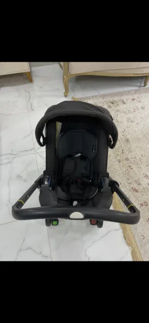 عربانه اطفال وتصير كرسي سياره اثنين في واحد