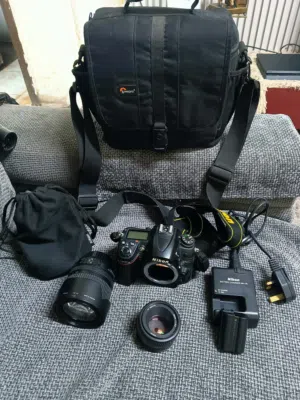 كاميرا نيكون D7000  معاها عدستين وحده 50mm والثانيه 105mm_25 كل قطعها نيكون اصليه