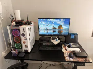 Gaming PC with accessories and adjustable standing desk