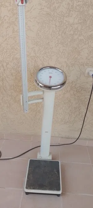 ميزان لقياس الوزن والطول