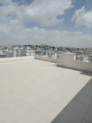 في أرقى مناطق الرابية شقة أخيرمع روف 215م بسعر مميز / ref 1198
