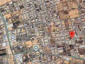 قطعة ارض في الكحيلي  مقام عليها كاتينة واعمدة