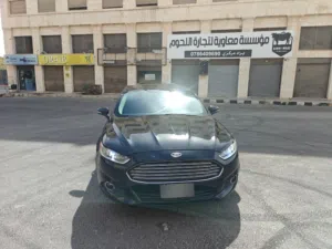 فورد فيوجن 2014 هايبرد مع اوتو بارك وفتحة وحالة ممتازة للبيع
