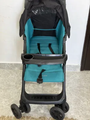 عربه اطفال بحاله ممتازه من جونيور