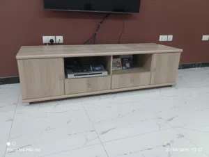 Good condition. Malaysian solid wood TV stand. with two drawers plus two side doors cabinet.