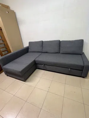 كنبة سرير زاوية رمادية مع تخزين(حالة ممتازة).      L-Shape Grey sofa Bed with storage