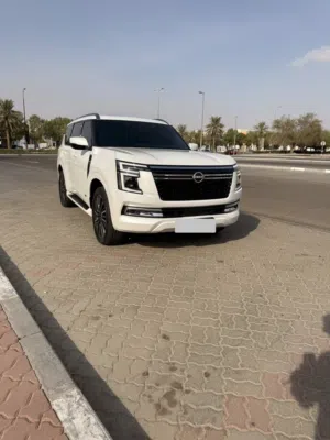 Nissan patrol LE Platinum Turbo - 100k KM contract service at Al Rostomani