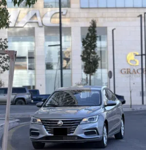 MG5 2023 لون فيراني مميزه فحص كامل كرت ابيض 7 جيد عداد 18 الف كيلو لم تعمل سياحي