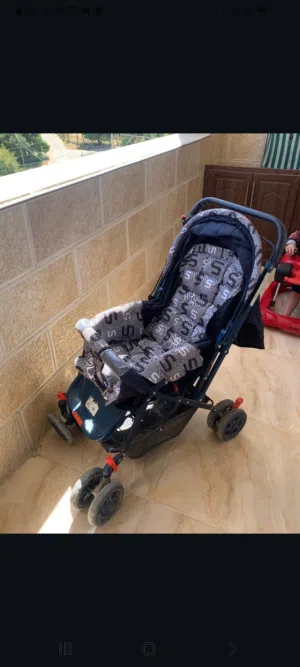 عرباية أطفال مع Child safety seat