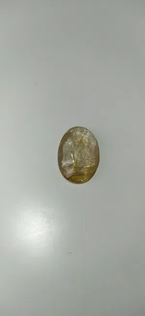 حجر الروتيل الذهبي (Rutile Quartz)، والمعروف في المنطقة باسم در النجف الروتيلي أو "در النجف بشعر ذهب