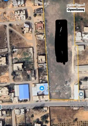 حوازة تجارية سكنية على طريق الرئيسي للبيع