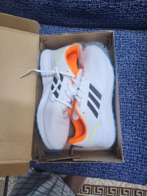 Orignal adidas shoe for sale new unused with box size 42.
