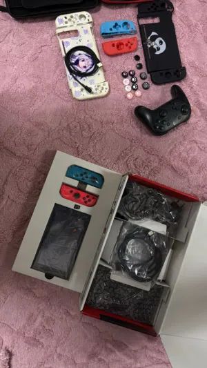 Nintendo Switch كامل مع كل الإكسسوارات + 256GB –بكج جاهز للعب