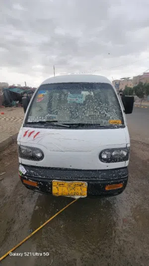 باص دايو موديل 2013 لون ابيض جير عادي اجره فاصل سته