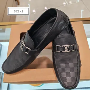 Louis Vuitton Hockenheim Moccasin, a hallmark driving shoe from the brand. This specific version fea