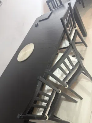 Big wooden table with 5 chairs bench and cushions