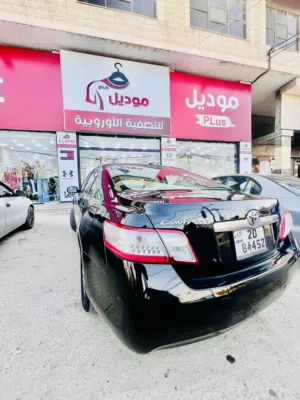 تويوتا كامري لون أسود بطارية فحص فل كامل إلى فتحة ولا تحتاج إلى اي صيانة 4جيد 2011 للاستفسار على الر