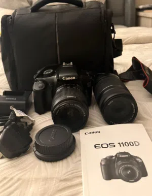 Canon EOS 1100D + عدستين 18-55 و 55-250  شبه جديدة مع كامل الملحقات