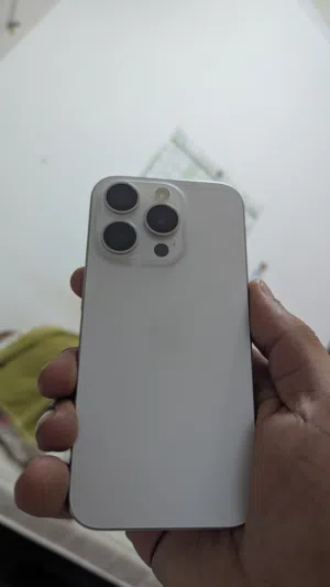 Iphone 15 pro white. 256 GB 87 % Battery  Not Repaired , NoT opened , Water Pack Condition 10/10.