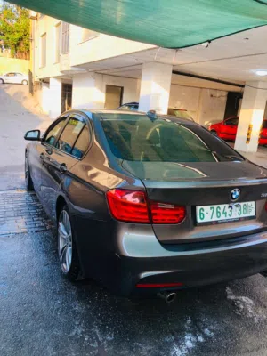 بي ام 320i موديل 2014 لون بني فاخرة جدا طولكرم