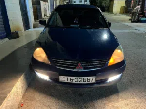 ميتسوبيشي لانسر 2006 بوز محدث 2013 بحالة جيدة