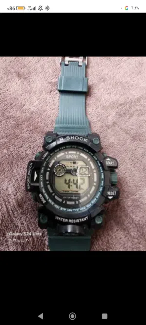 ساعة الأصلية  (R-SHOCK) من كاسيو ذات الجودة العالية ومقاومة الماء لأكثر من 200 متر (20 ضغط جوي)