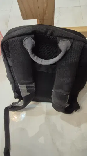 black lenovo backpack, inside the bag is perfect condition