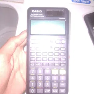 IT IS FX-991ES PLUS A CASIO CALULATOR USED ONLY 1 MONTH AND 2ND EDITION CALCULATOR