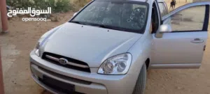 كيا كارينز موديل2000 ماشية 89 خالية من السوس َوالقص كيف مسجله تو مكانها طرابلس سعرها 25الف