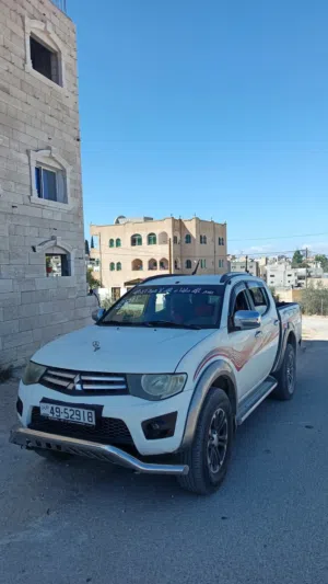 بكم 4/4 2011 L200 فحص كامل كرت ابيض