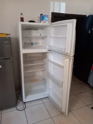 Sharp, white color big size freezer for sale, neat and clean, Original parts