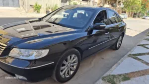 ازيرا 2009 سيارة امورها ممتازة تكيف كربون محرك كنبيو ربي يبارك