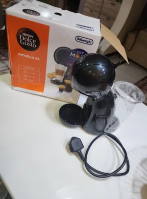 ماكنه قهوه كبسول  ديلونجي بريطاني اصلي من شركه Nescafe Dolice Gusto