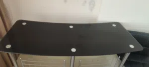 Bar table glass with 3 metal chairs  and one leather chair very well maintained not chips