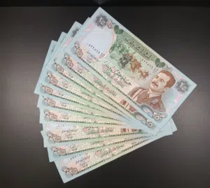 * عرض *  عدد عشرة عملات صدام حسين الطبعة السويسرية الأصلية  وبحالة عالية جدا