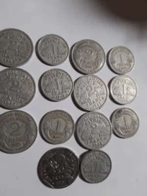 عملة معدنية قديمة أمريكي انكليزي اسباني فرنسي