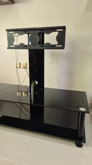 طاولة زجاجية مع ستاند تلفزيون