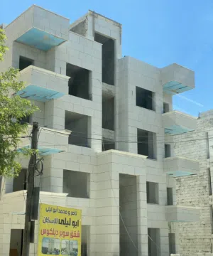 شقة طابق اخير مع روف وترس في تلاع العلي  مقابل الجامعة الاردنية - امكانية الاقساط