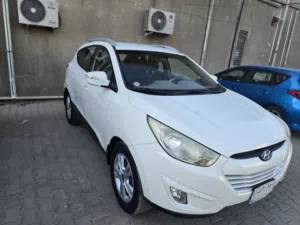 سيارة توسان 2013 خليجي ابيض