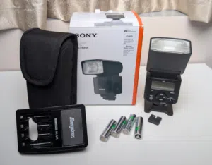 Sony HVL-F46RM Flash & Power Kit Sony HVL-F46RM Flash: With box. Power: Charger and 4 rech
