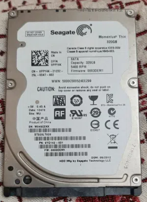 للفنيين: بوردة هارد Seagate أصلية سليمة + بطارية Dell J1KND