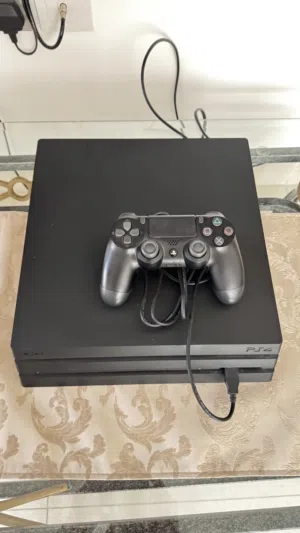 Sony PlayStation PS4 Pro 1TB  with 2 Controllers and 9 Games (Price Reduced)