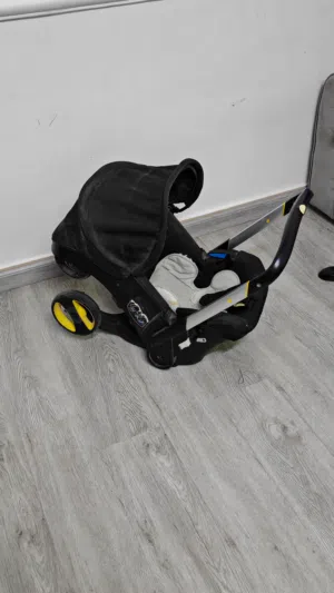 عربة اطفال وكارسيت