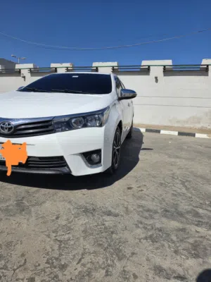 للبيع في بورتسودان   كورلا   موديل ،16  لون ابيض   مفتاح  تحكمات دركسون