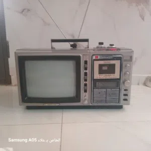 تلفون مع كسيت مع راديو بحاله الوكاله